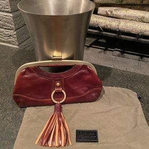 Lazaro leather clutch with tassel